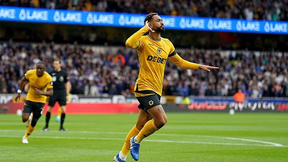 | Photo: Joe Giddens/PA via AP : Premier League 2024-25: Wolverhampton Wanderers' Matheus Cunha celebrates scoring against Chelsea